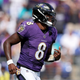 Lamar Jackson #8 of the Baltimore Ravens celebrates a touchdown pass in the second quarter against the Miami Dolphins at M&T Bank Stadium on September 18, 2022, in Baltimore, Maryland.